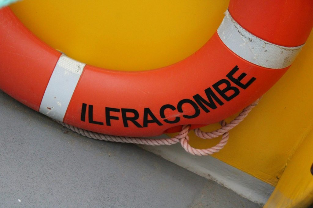 A close up of a life-ring with "Ilfracombe" printed on the side.